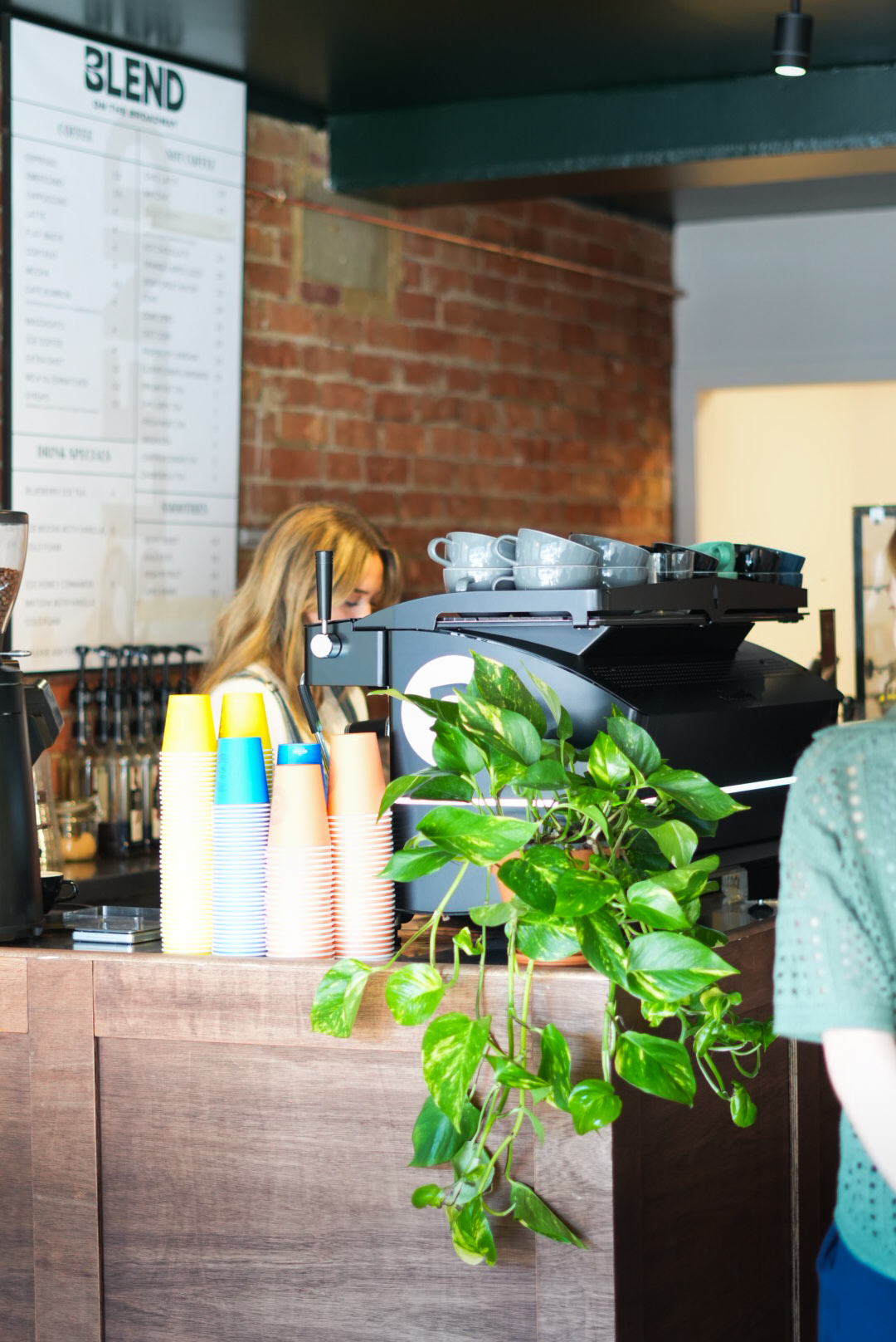 The espresso bar and menu board at Blend Broadstone