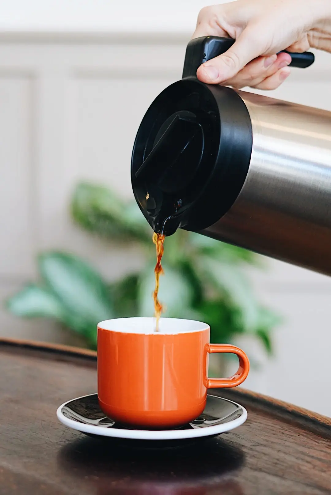 Batch brew pouring into a cup