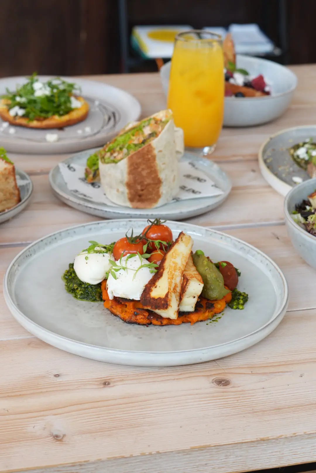 Halloumi hash with poached eggs on the table
