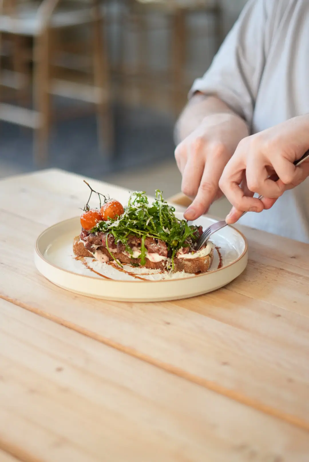 Steak sourdough plated with tomatoes